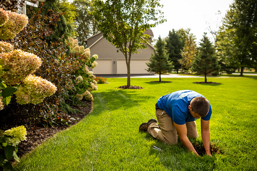 irrigation team repairs sprinkler system