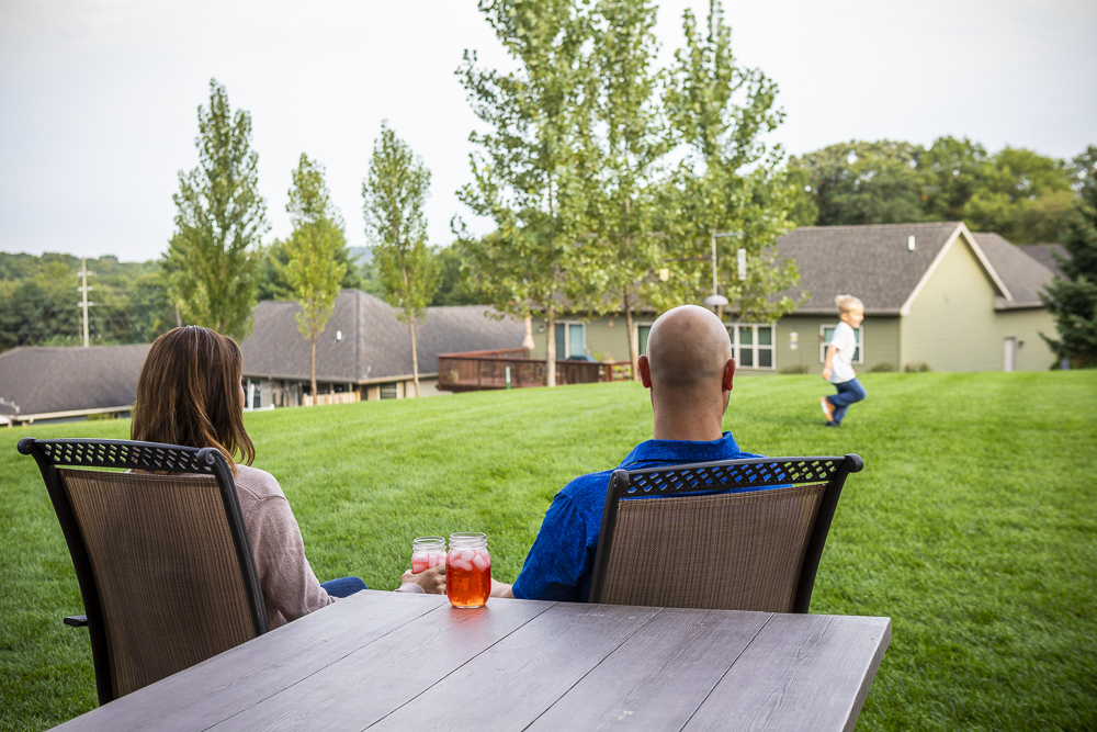 Family enjoying their lush green lawn