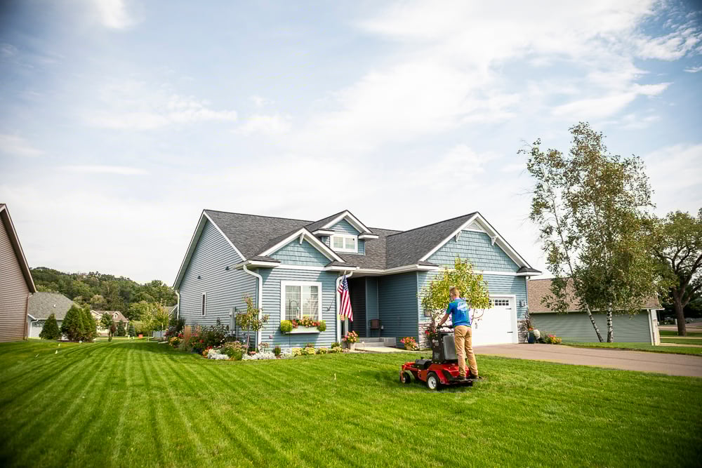 Lawn team aerating new lawn